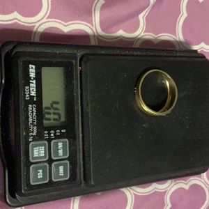 10 kt. Gold ring never use was bought for my son but he doesn’t like gold